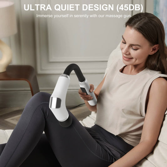 Woman using a massage gun with text highlighting ultra quiet design in a living room setting.
